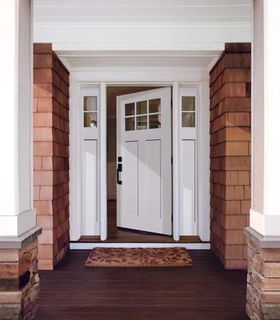 Brushed smooth fiberglass entry door, in a craftsman style with sidelites, prefinished in white